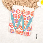 Beige flip flops